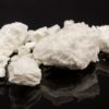 A close-up image of crack cocaine, a crystalline form of the drug, often associated with high addiction potential and serious health risks.