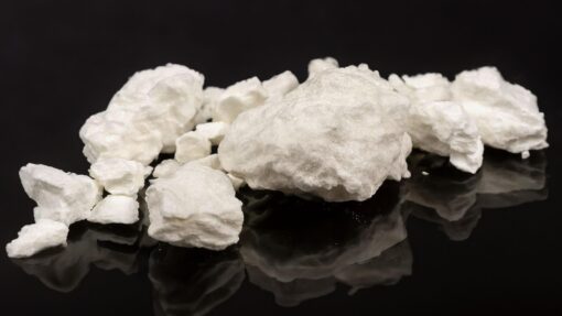 A close-up image of crack cocaine, a crystalline form of the drug, often associated with high addiction potential and serious health risks.