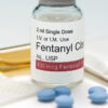 Fentanyl pills in various shapes and sizes, a synthetic opioid used for pain management but also abused illicitly.