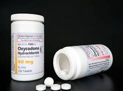 An image of oxycodone tablets or capsules, typically used for pain management, highlighting their prescription-only status and potential risks of misuse.