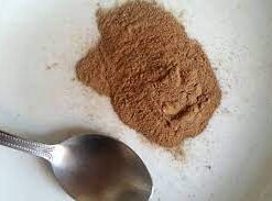 A close-up image of brown cocaine (brown-brown), a less refined and often impure form of the drug, known for its high addiction potential and serious health risks.